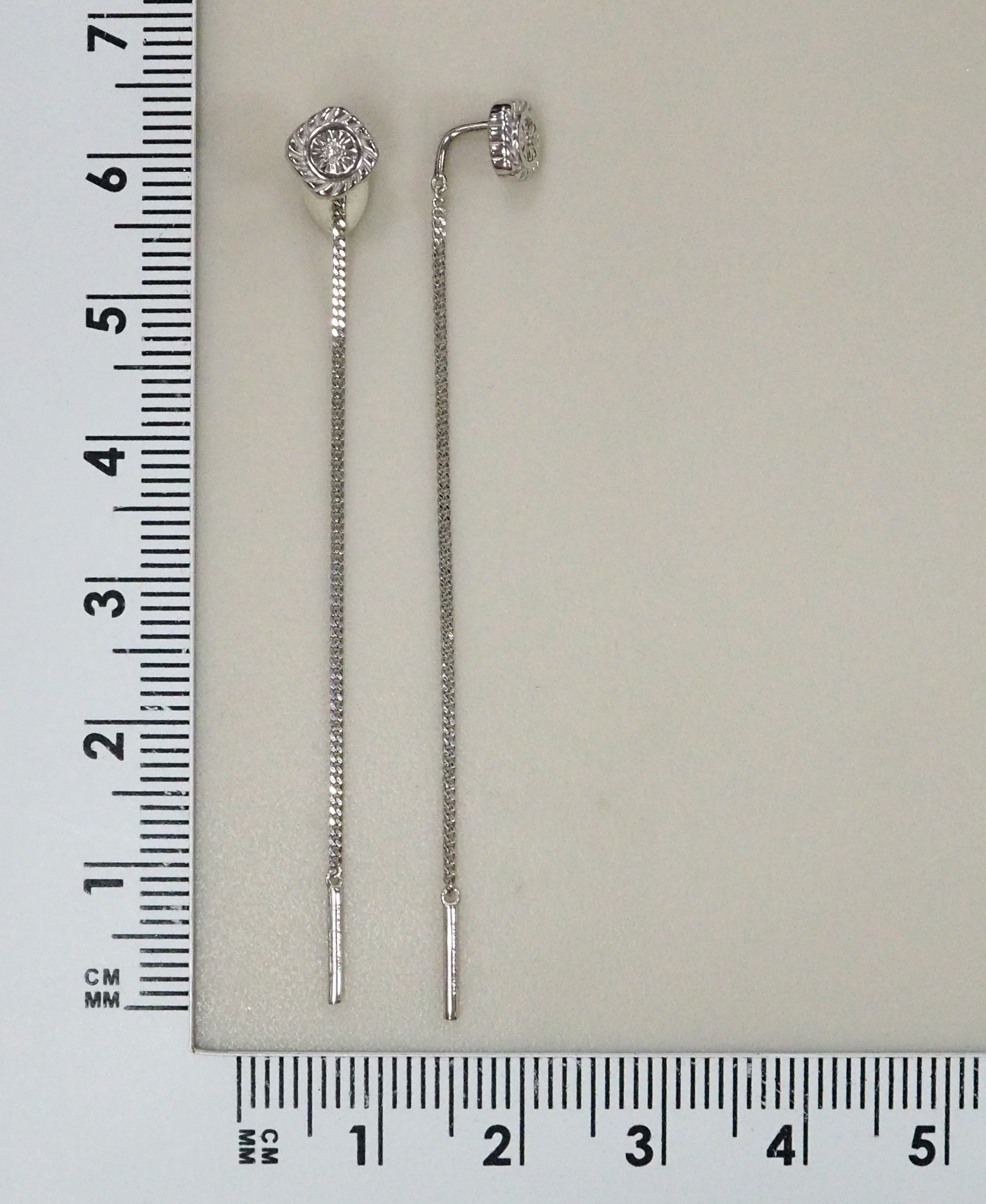 Серебряные серьги-протяжки с бриллиантами